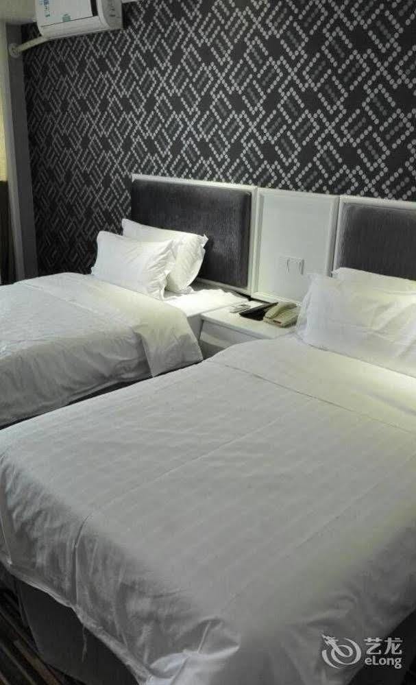 New Zhongxun Business Hotel Yueyang Bagian luar foto
